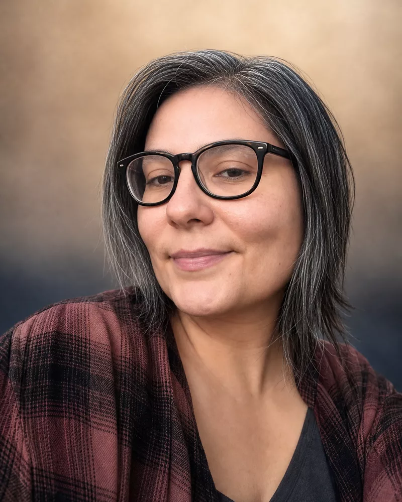 Celina, owner and operator of Grumpy Dog Software